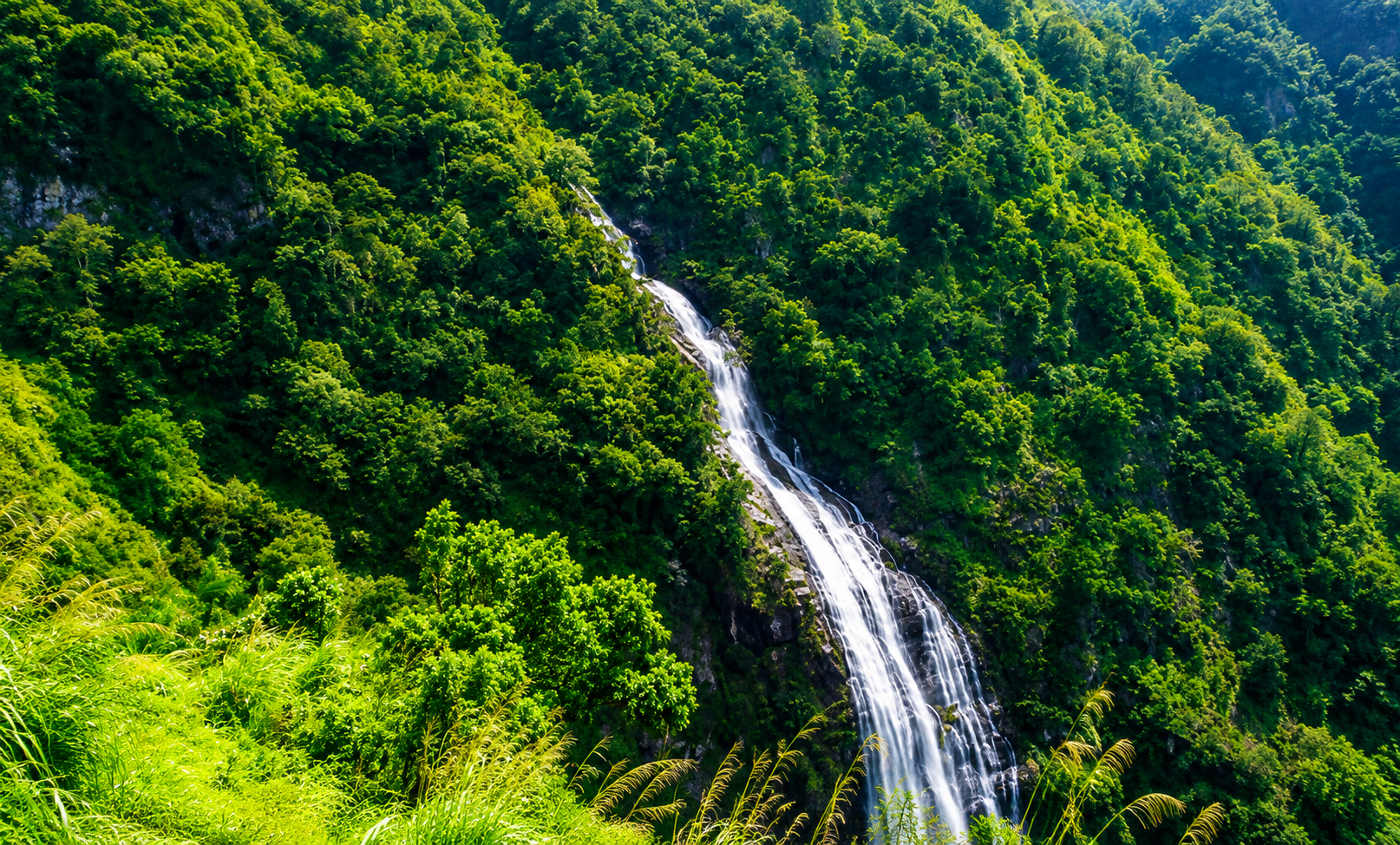 Aerial view of Seetharkundu Waterfalls is the main attractions en route Nelliyampathy near Mango Village Resort, Palakkad.